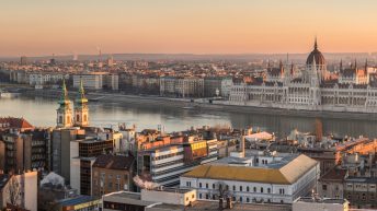 Discover what to do in Budapest. The best things to do in Budapest on trips to budpatest. From the chain bridge budapest to the budapest Christmas market. Wide Panorama of Budapest with Hungarian Parliament and Danube River at Sunrise